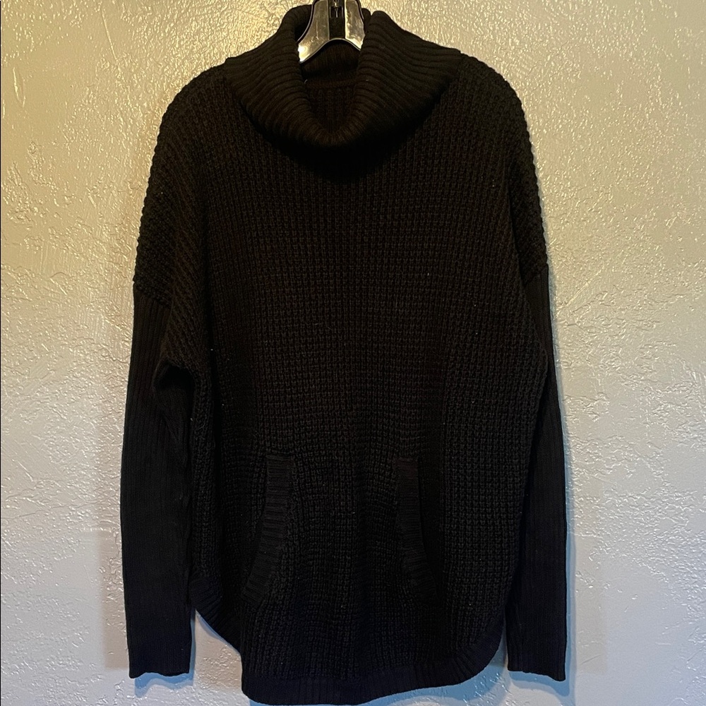 Woman’s Black Turtleneck Sweater